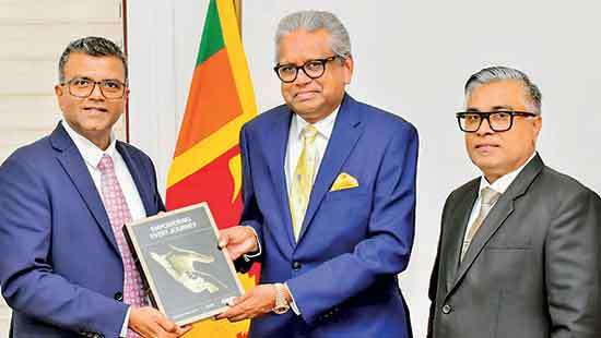 NSB hands over Annual Report 2025 to Treasury Secretary