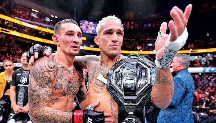 UFC: Oliveira dominates Holloway to win BMF title