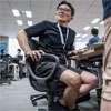 Tokyo urges men to wear shorts to work, but some women say it’s ’leg hair harassment’
