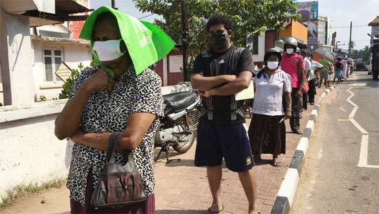 Lengthy queues at pharmacies