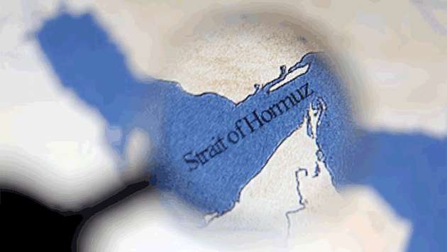Hormuz at near standstill as Iran warns ships to keep to its waters