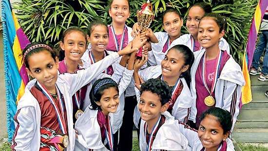 Holy Cross girls outsmart Colombo’s elite