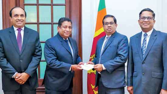 CSE donates Rs.25mn to post-Ditwah Rebuilding Sri Lanka Fund
