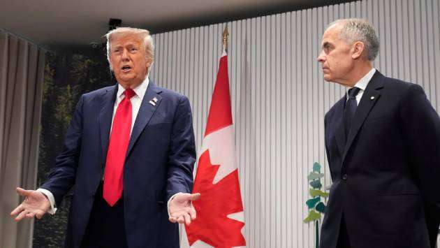 Trump threatens Canada with 100% tariffs if it ’makes a deal with China’
