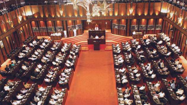 Opposition MPs storm into well of Parliament after Speaker refuses privilege issue
