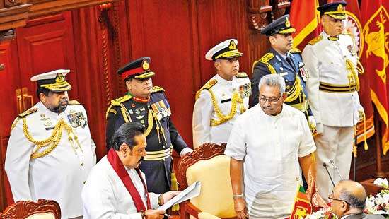 Sri Lanka’s new leader appoints his PM brother as Finance Minister