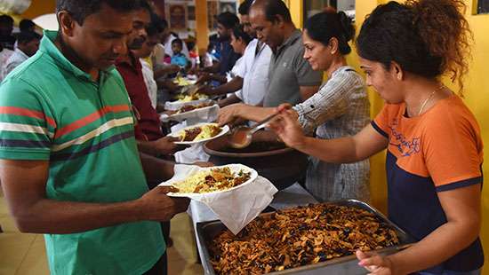 Sharing a meal on Vesak Day