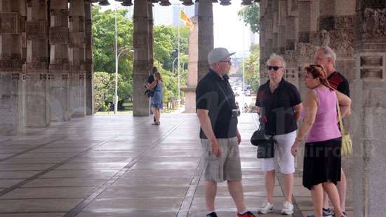 Tourists enjoy a walk