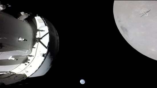 Orion spacecraft flies by the moon