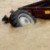 Five children missing after tractor swept away in floodwaters