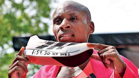 Kenyan runs London Marathon inside two hours