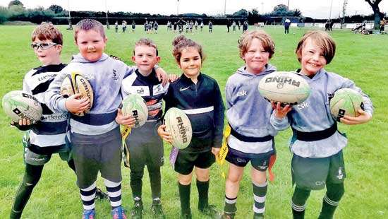 Rugby nursery gets first taste of Red and Yellow