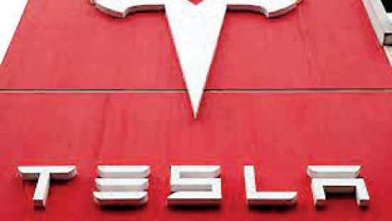 Tesla warns of ‘notably lower’ sales growth in 2024