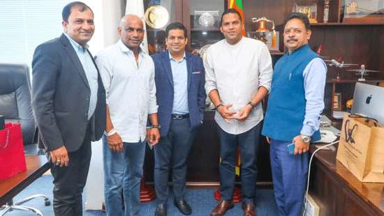 Adani Company officials call on Minister Harin