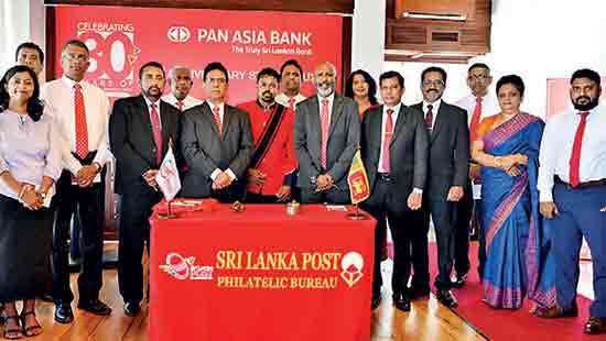 Pan Asia Bank marks 30 years with a commemorative stamp