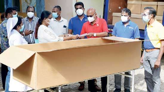 UNIDIL Packaging donates corrugated board coffins to Dompe Base Hospital