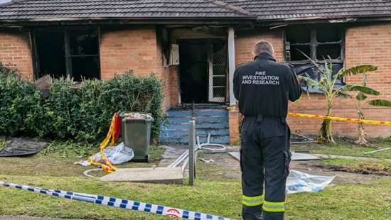 Three children dead, man in custody after house fire in Sydney’s west