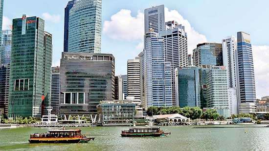 S’pore economy shrinks in warning for global trade