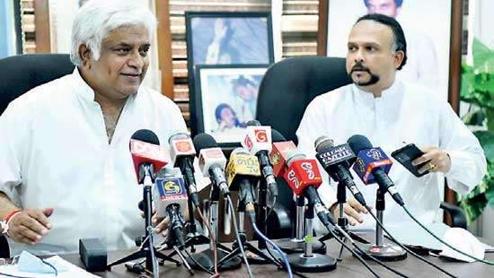 Navin, Arjuna call for UNP leadership change and merger with SJB