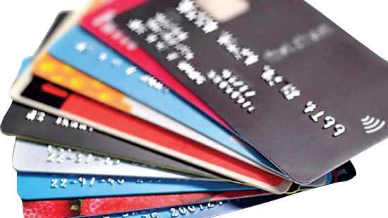 Banks push card offers but debt growth remains tepid