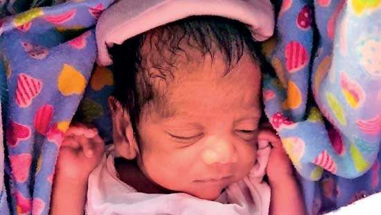 One month-old baby found in bag outside retired health officer’s home
