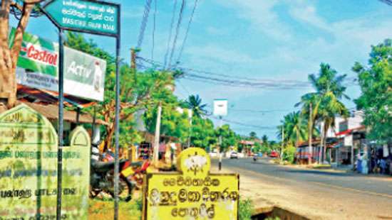 Extremists replacing Sinhala signboards with those in Arabic: Prelate