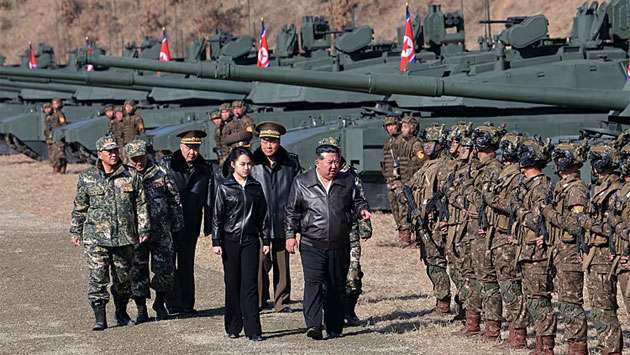 Teenage daughter of North Korean leader Kim Jong-un drives tank at military drill