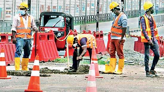 work on roads, bridges to continue despite quarantine curfew : highways minister