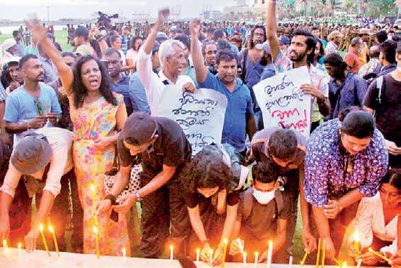 A candle vigil was held to mark the six months since the launch of Aragalaya at Galle Face yesterday.