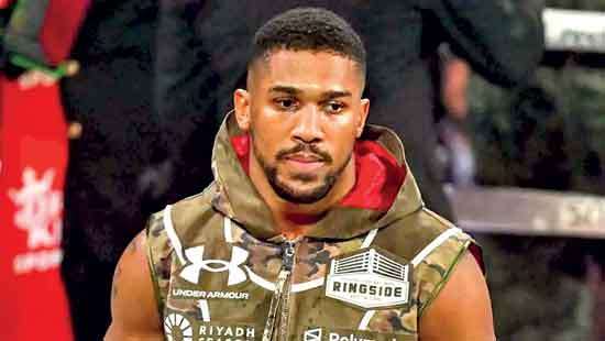 Tragedy survivor Anthony Joshua back at the gym