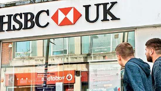 Higher interest rates help to more than double HSBC profits