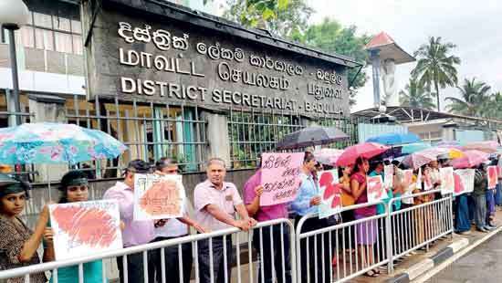 Staff members, civil society activists up in arms against transfer of Badulla District Secretary