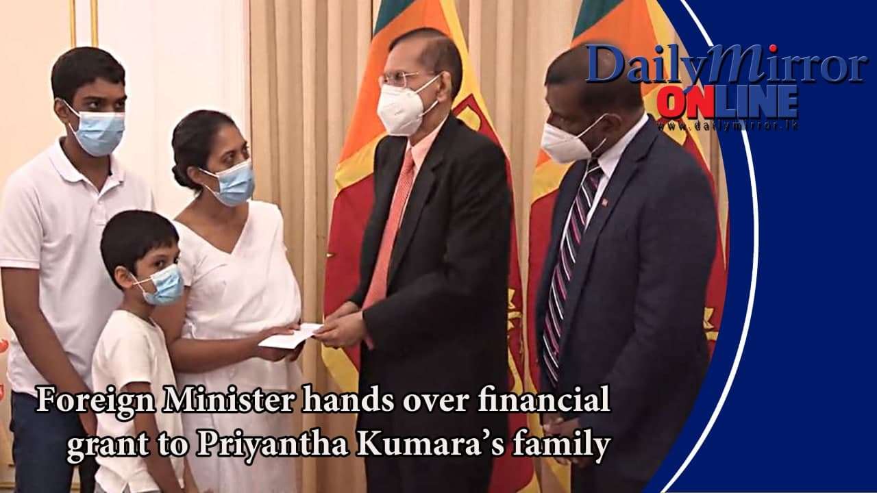 Foreign Minister hands over financial grant to Priyantha Kumara’s family