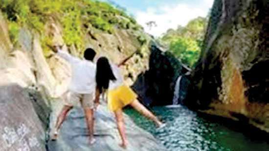 CID arrests couple involved in pornographic video filmed at Pahanthudawa waterfall