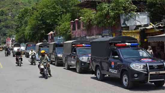 At least 11 killed in Pakistan-administered Kashmir clashes before rally