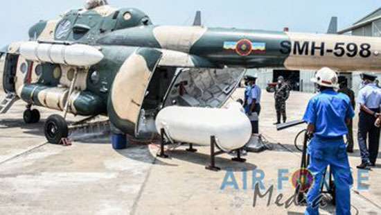 Air Force modifies helicopters to spray disinfectant by air