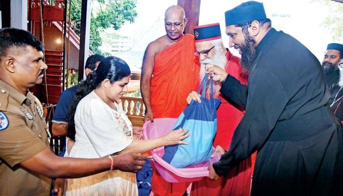 Gangarama Temple and Believers Eastern Church assist the needy