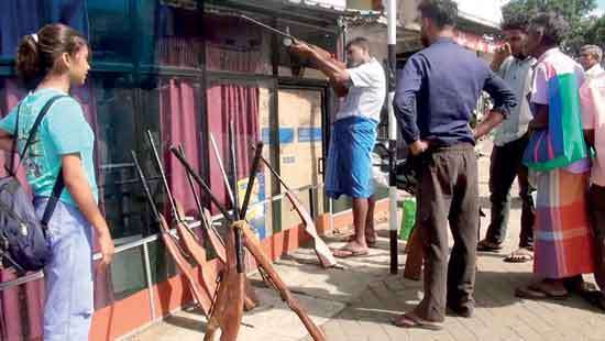 Locally made firearm to scare animals out in the market