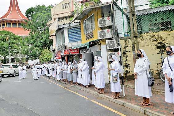 Display of solidarity for Fr. Cyril Gamini