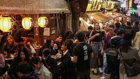 Japan halts new foreign worker intake for food services as quota nears