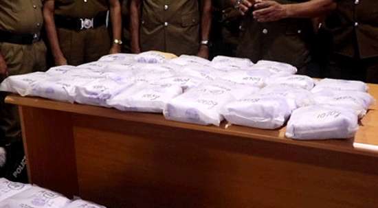 Mother, son nabbed with heroin worth Rs. 550 mn