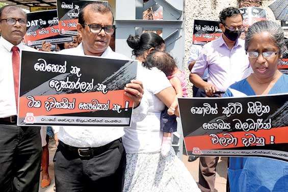 Doctors stage protest against former Health Minister