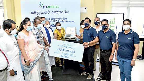 SLT-Mobitel demonstrates purposeful leadership donating PCR machines to District Hospitals