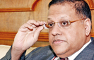 Governor Mahendran resumes duty after bond probe report