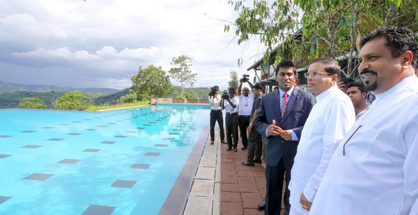 President declares tourist hotel open