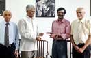 Pathfinder presents economic proposals to JVP General Secretary
