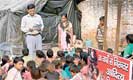 Indian teacher gets on his bike to help slum children