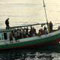 97 arrested while fleeing to Australia