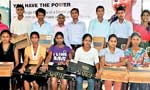 Abans present free laptops to deserving students