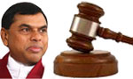 Court rejects motion not to arrest Basil on arrival